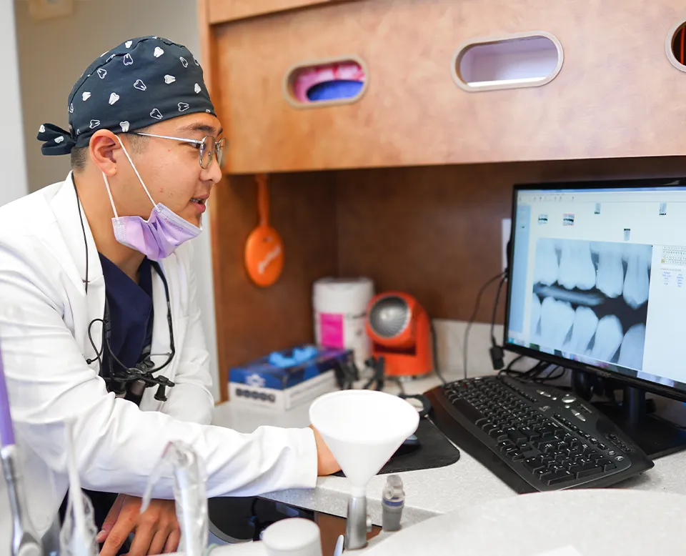Dr. Zhang working on patients smile design at Fullerton Smile Dentistry