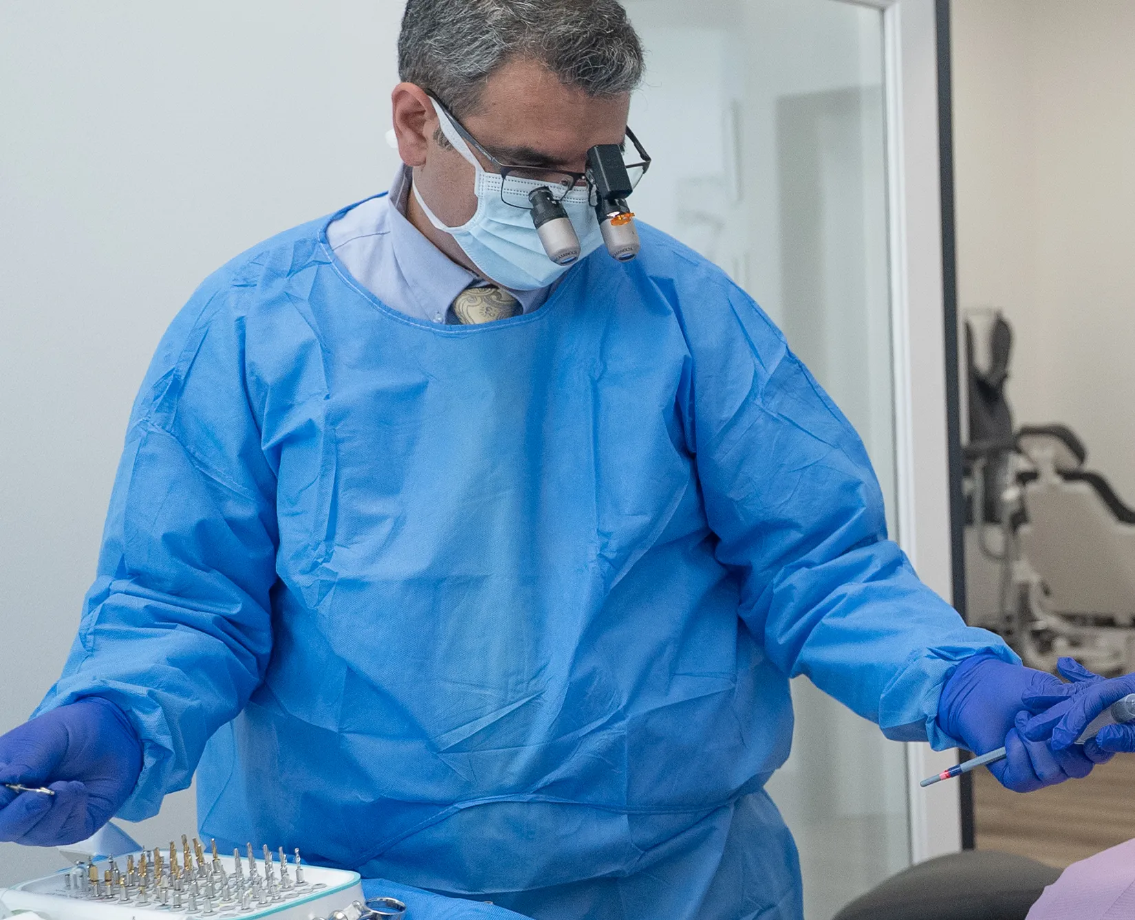 Male with tooth implant smiling
