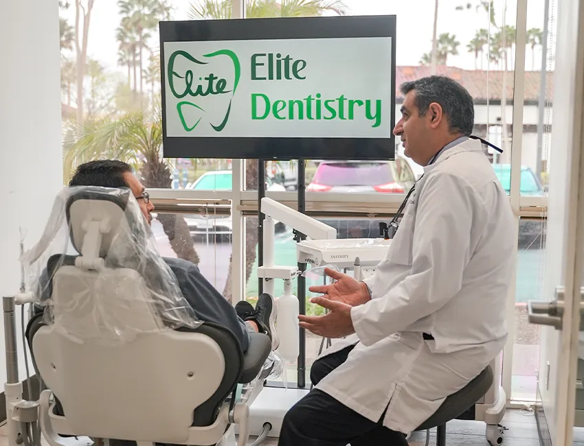 Happy patient after getting dental checkup at Elite Dentistry
