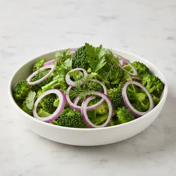 Crunchy Mix Of Raw Broccoli, Red Onion, And Herbs