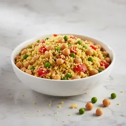 Couscous With Chickpeas, Peas, And Tomatoes
