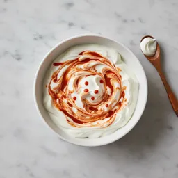 Greek Yogurt And Sriracha Sauce Mixture