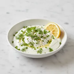 Nonfat Greek Yogurt With Fresh Herbs, Lemon Juice, And Pepper