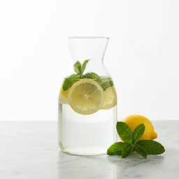 Water Infused With Fresh Lemon Slices And Mint Leaves