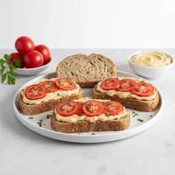 Whole Grain Bread With Hummus And Tomato