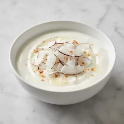 Natural Yogurt With Pieces Of Fresh Coconut