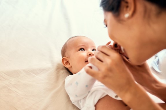 When should you start playing with a newborn?