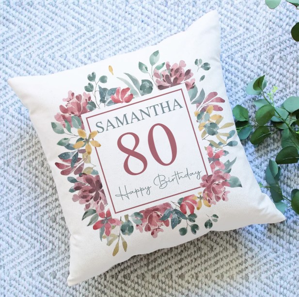 https://storage.googleapis.com/loveable.appspot.com/blog/uploads/2023/05/23234102/80th-Birthday-Floral-Pillow.jpg