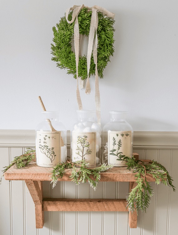 Faux Pines On Shelf