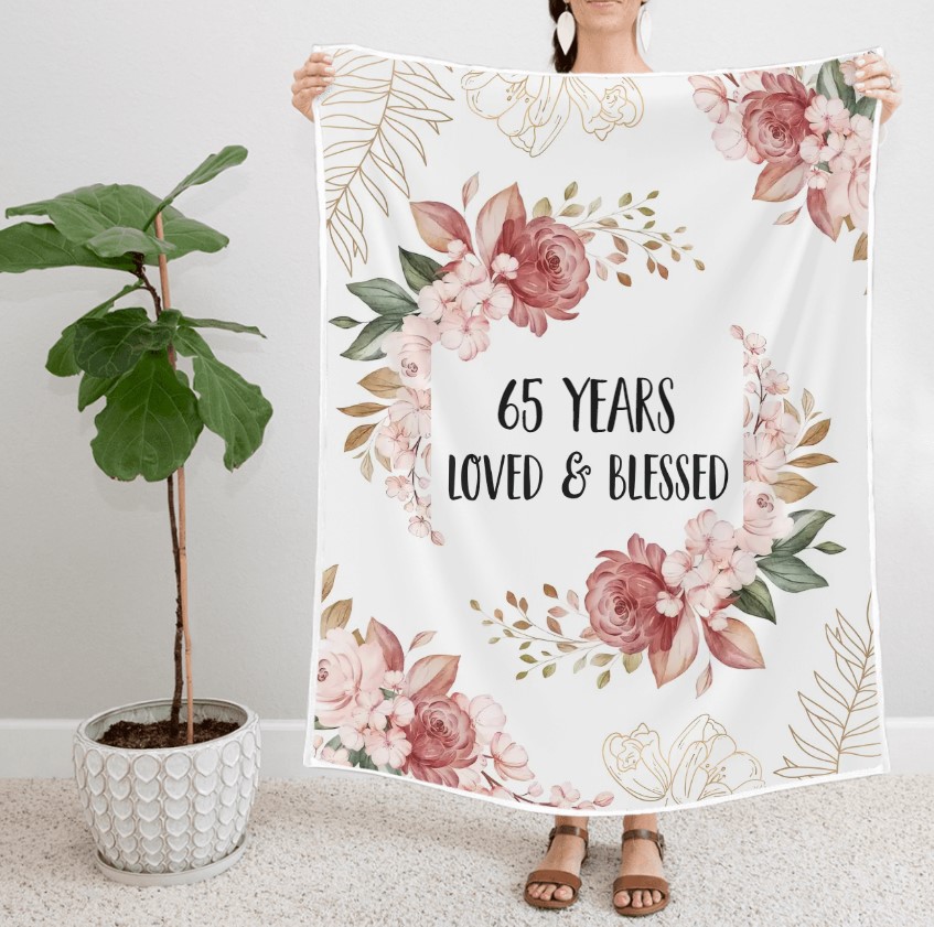 https://storage.googleapis.com/loveable.appspot.com/blog/uploads/2023/09/05164029/65-Years-Loved-Blessed-Floral-Blanket.jpg