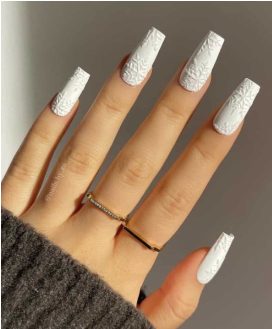 Black, white, and silver nails with gems. Very pretty.