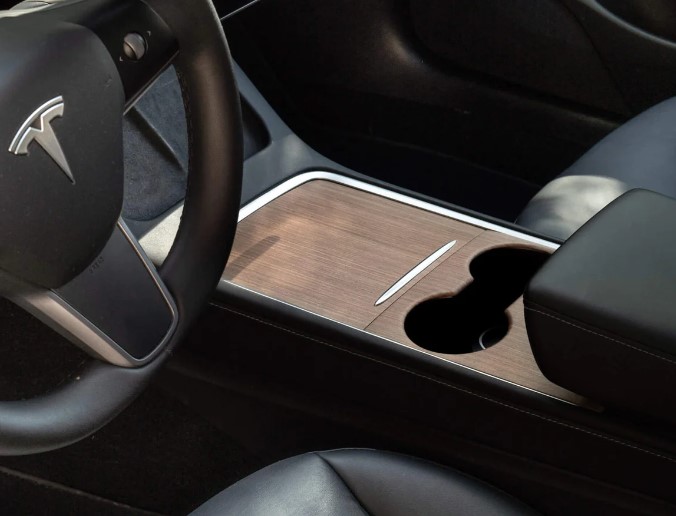 https://storage.googleapis.com/loveable.appspot.com/blog/uploads/2023/12/16112320/Genuine-Wood-OEM-Upgrade-for-Tesla-Model-3.jpg