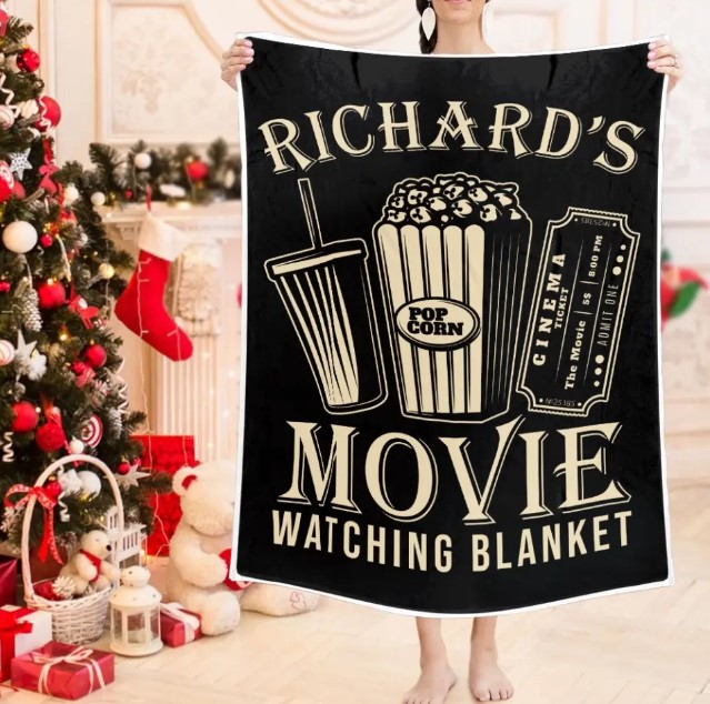 https://storage.googleapis.com/loveable.appspot.com/blog/uploads/2023/12/19213714/Personalized-Movie-Watching-Blanket.jpg