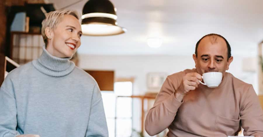 A couple having coffee.
