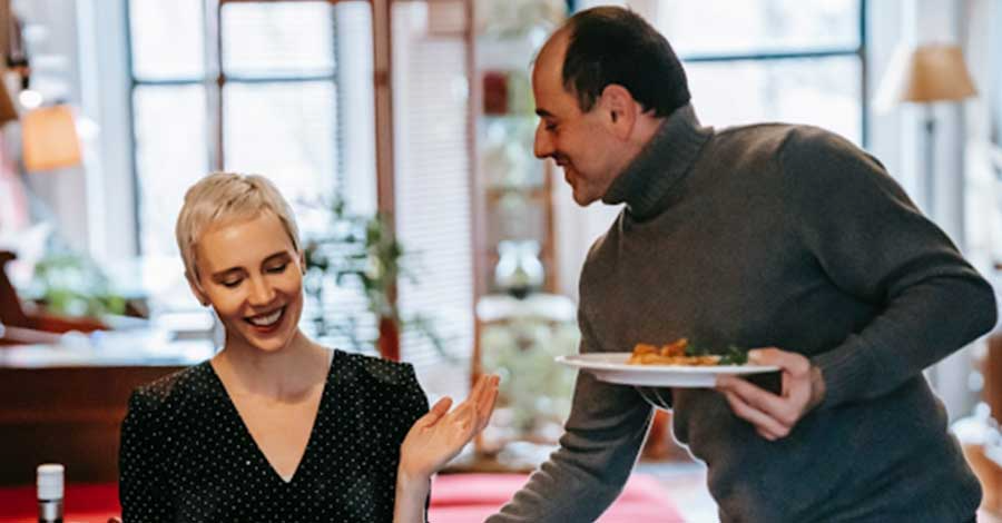 A couple sharing a meal.