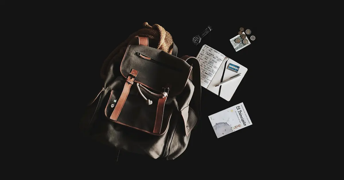 A flatlay of travel essentials.