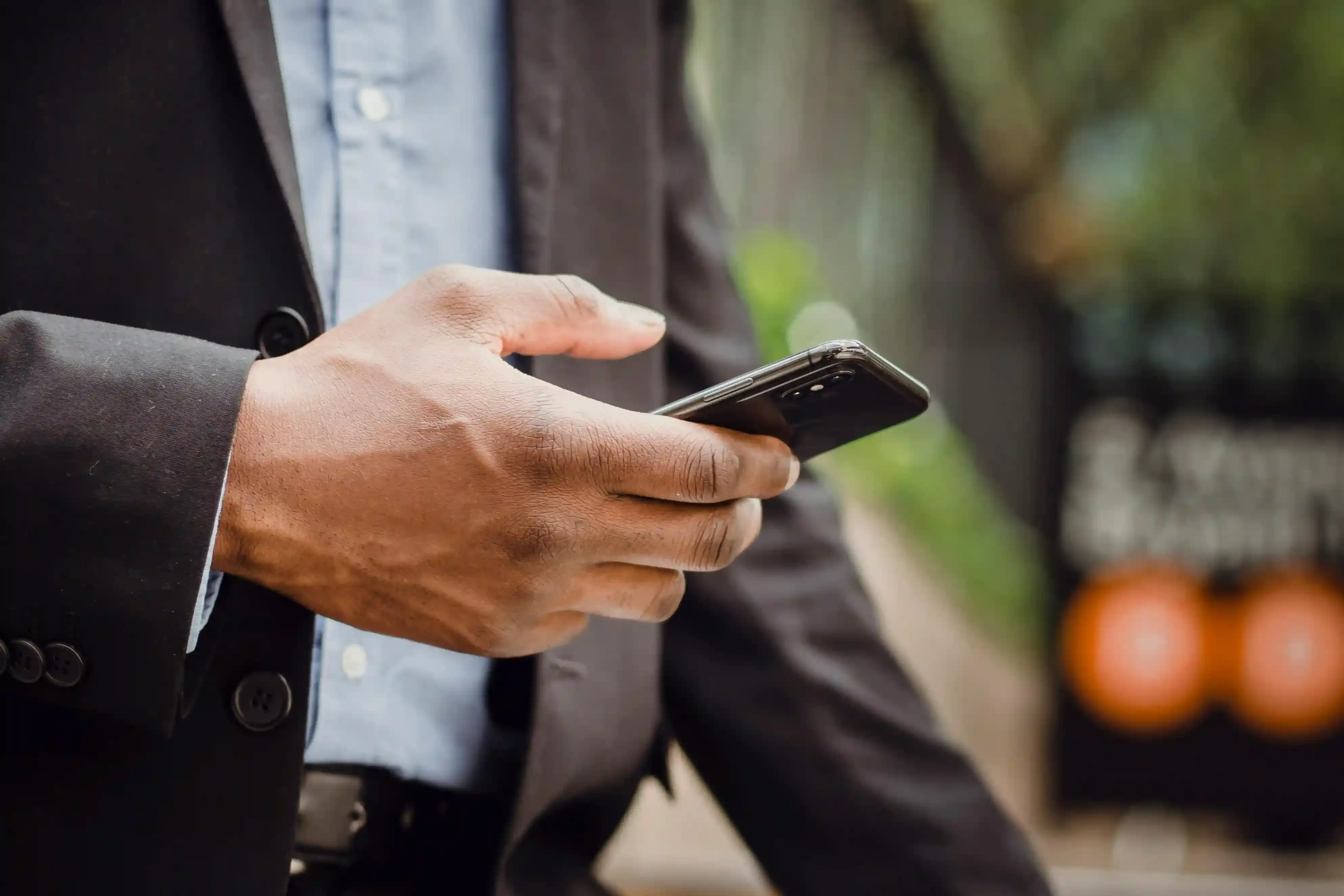 A man on his phone on the streets