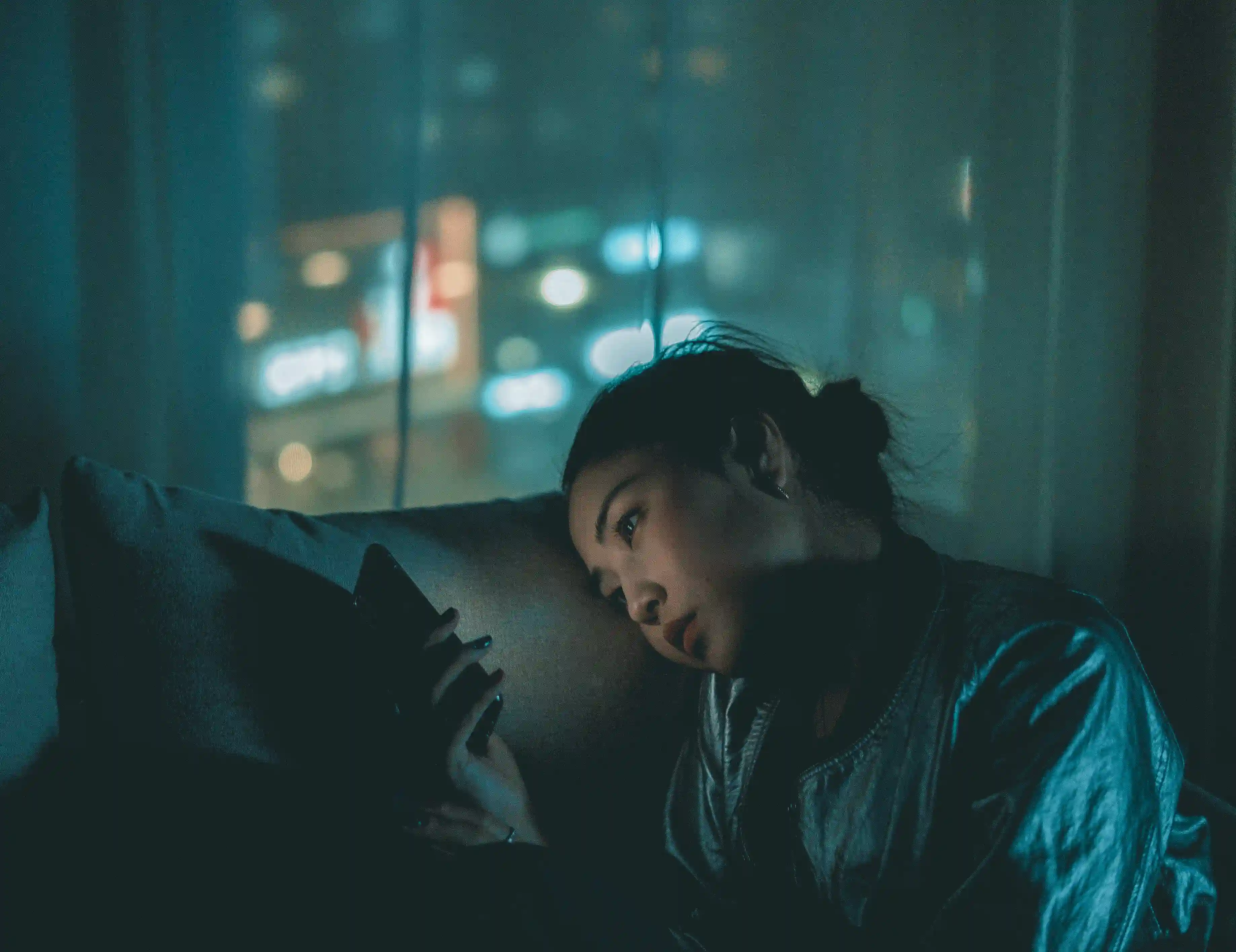 woman looking at phone