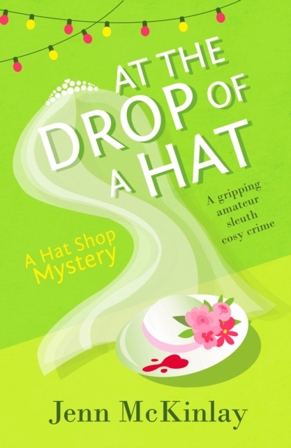 Book Cover for At the Drop of a Hat by Jenn McKinlay