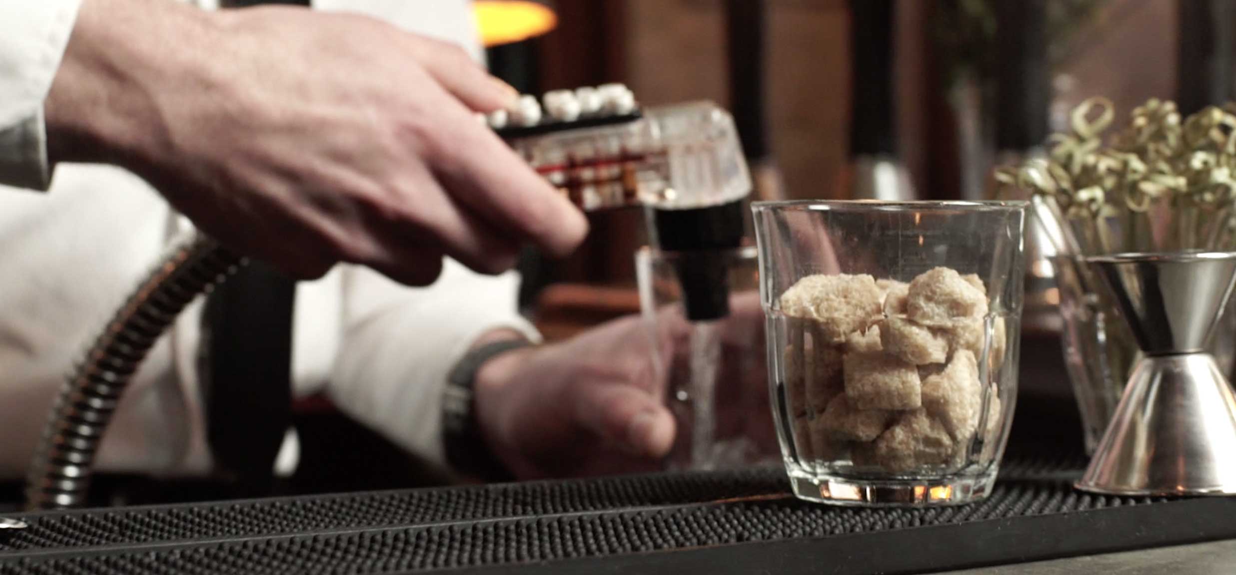 Bartender serving a drink