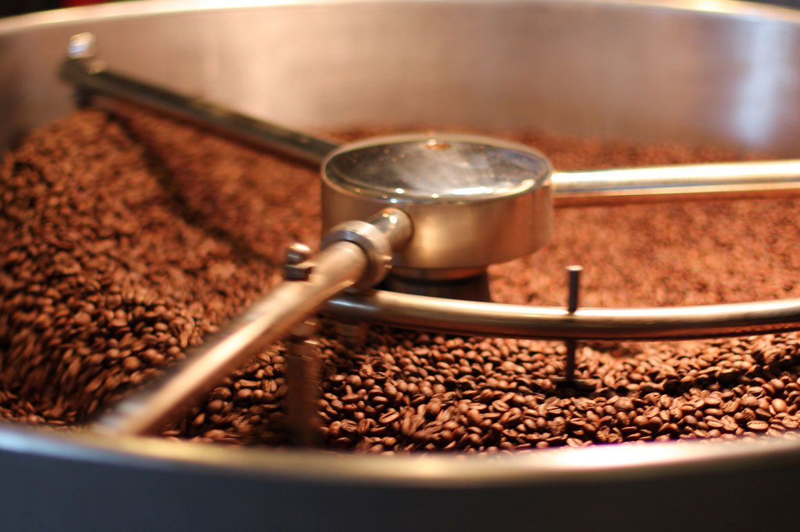 coffee beans roasting in a coffee roaster