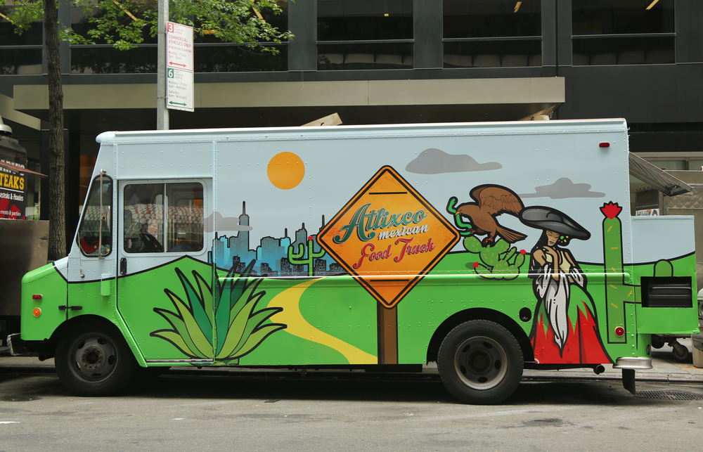 food truck with a logo on the side