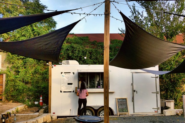 food truck underneath tent - opening a food truck busines