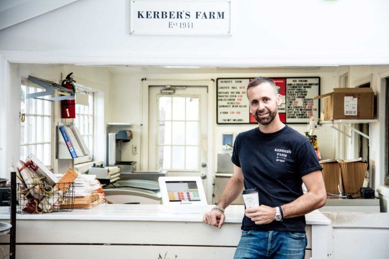 Owner of Kerber’s Farm leaning against counter - what is a business plan