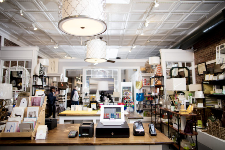 image of front of store and ShopKeep terminal - inventory control procedures