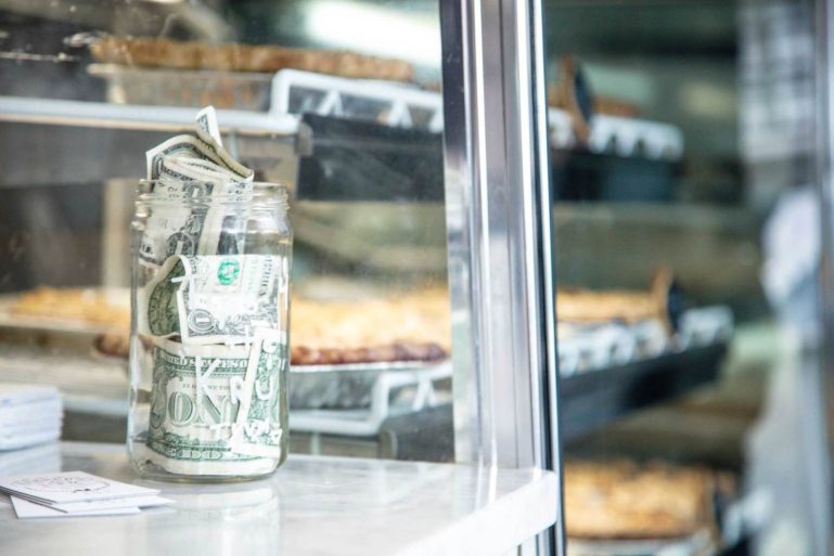 tip jar on a counter - advantages of debt financing