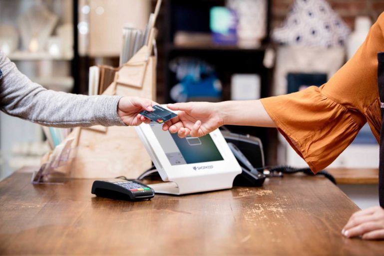 customer paying with credit card - how to run a better business