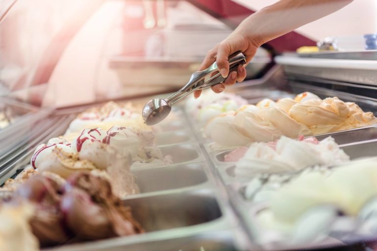 woman-scooping-ice-cream_starting-an-ice-cream-truck-business