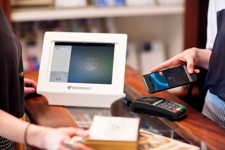 ShopKeep merchant using Apple Pay with an iPad cash register