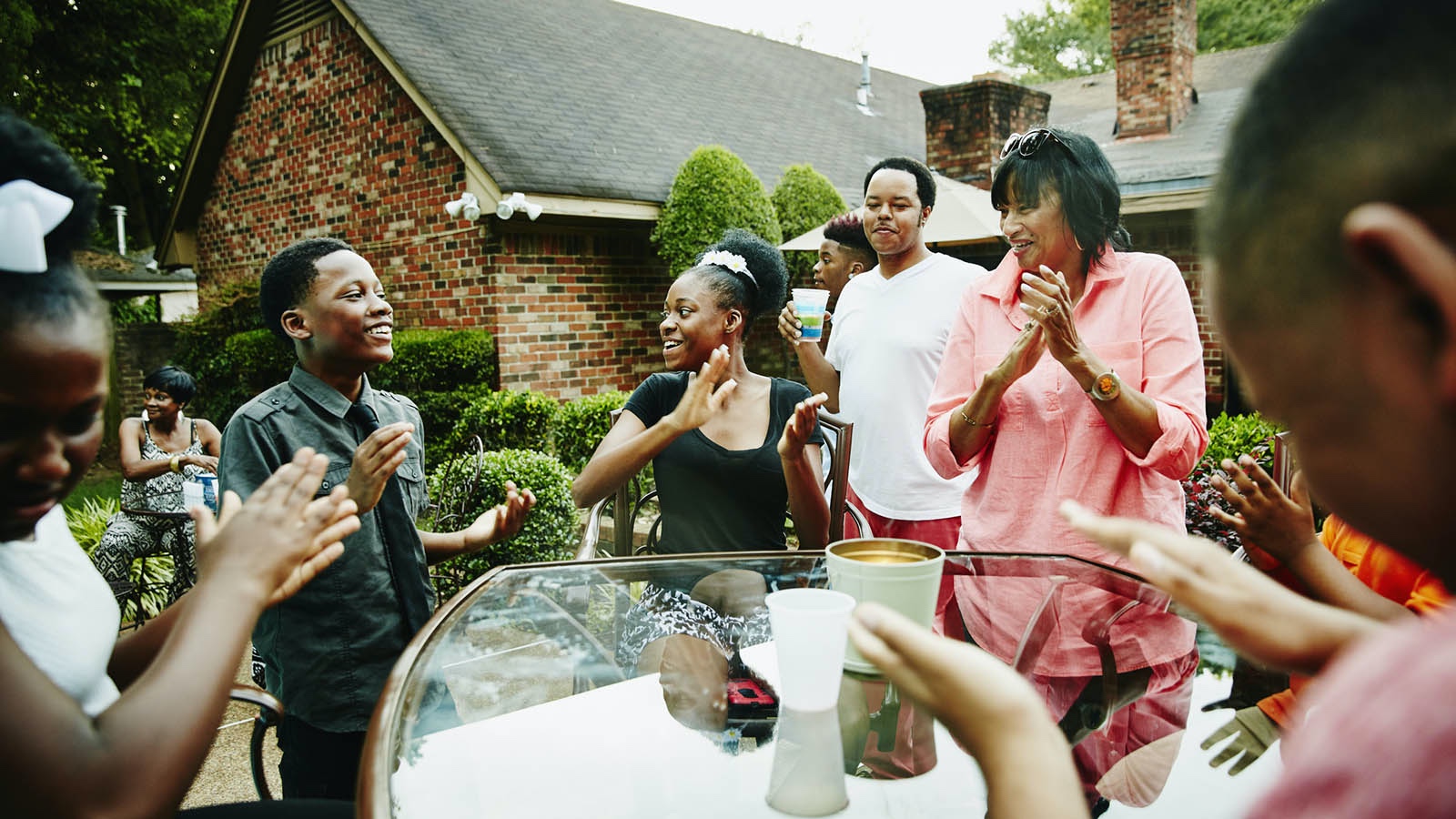 family playing bang clap snap game