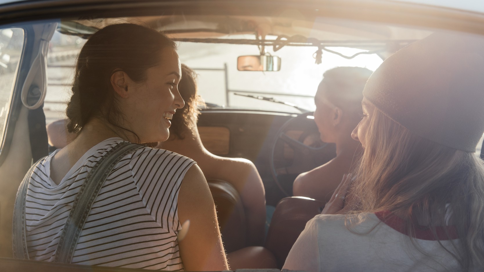 people talking in car