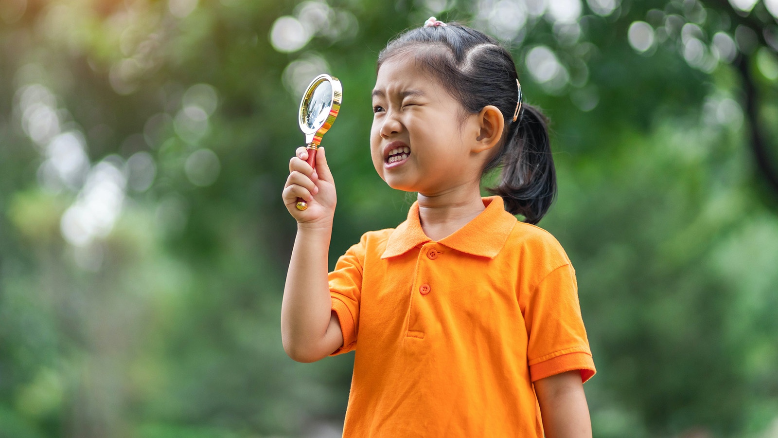 Young girl playing game I Spy (With My Little Eye)