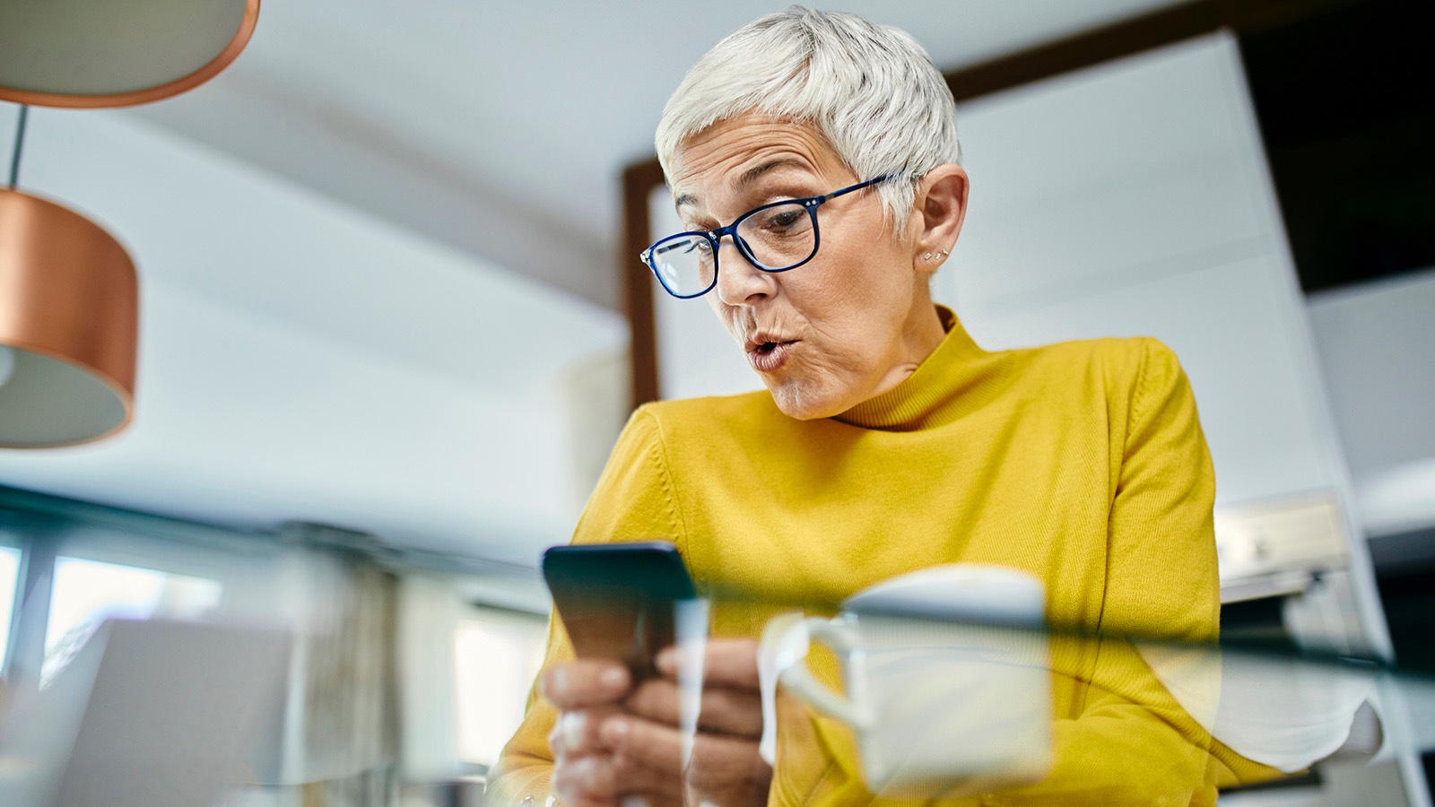 Woman playing Words with Friends on her phone