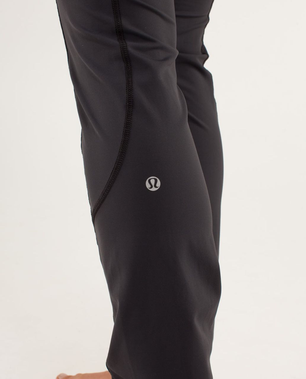 Lululemon Run:  Bright At Night Pant - Deep Coal / Flare Light