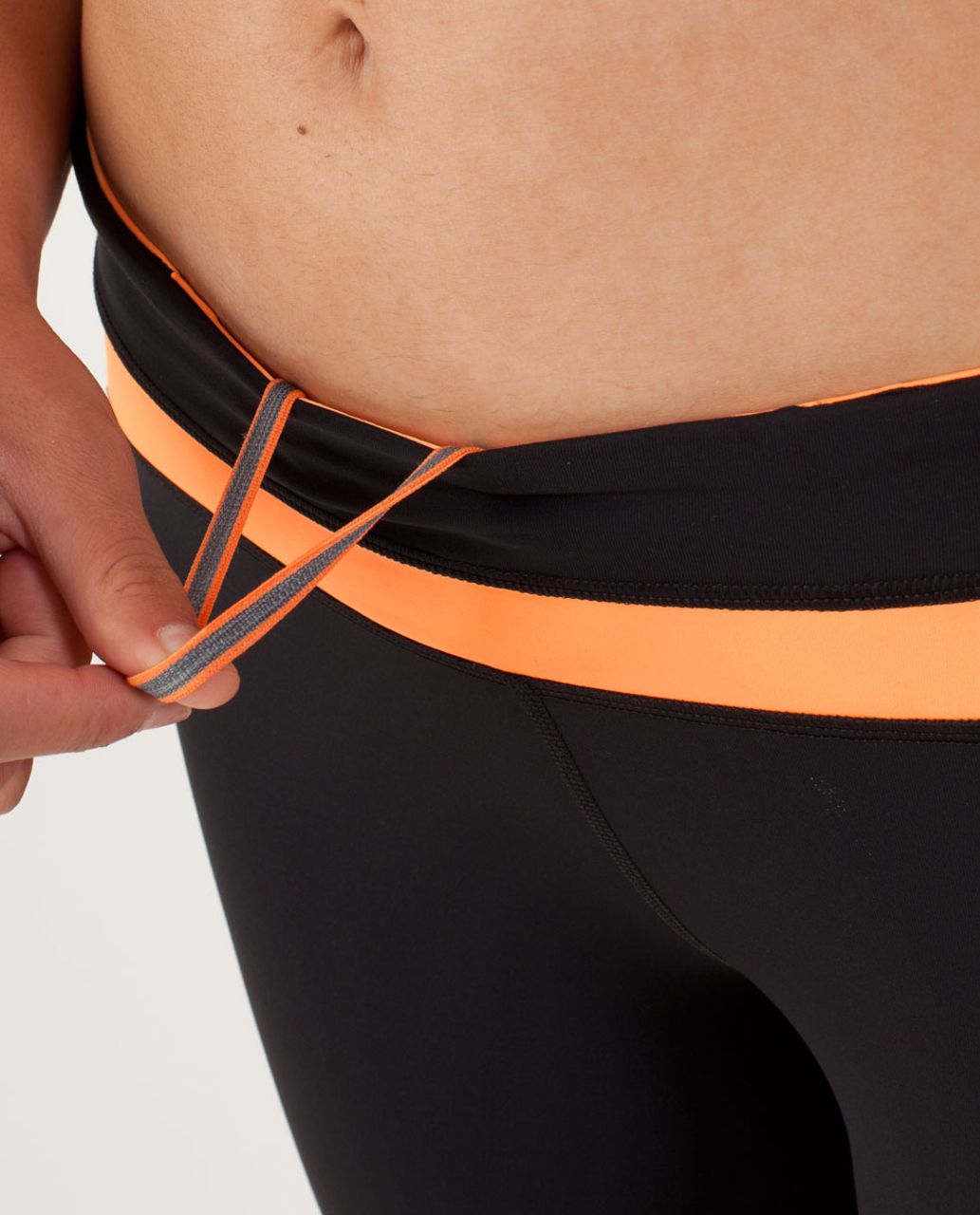 Lululemon Run:  Inspire Crop II - Black / Creamsicle Pop