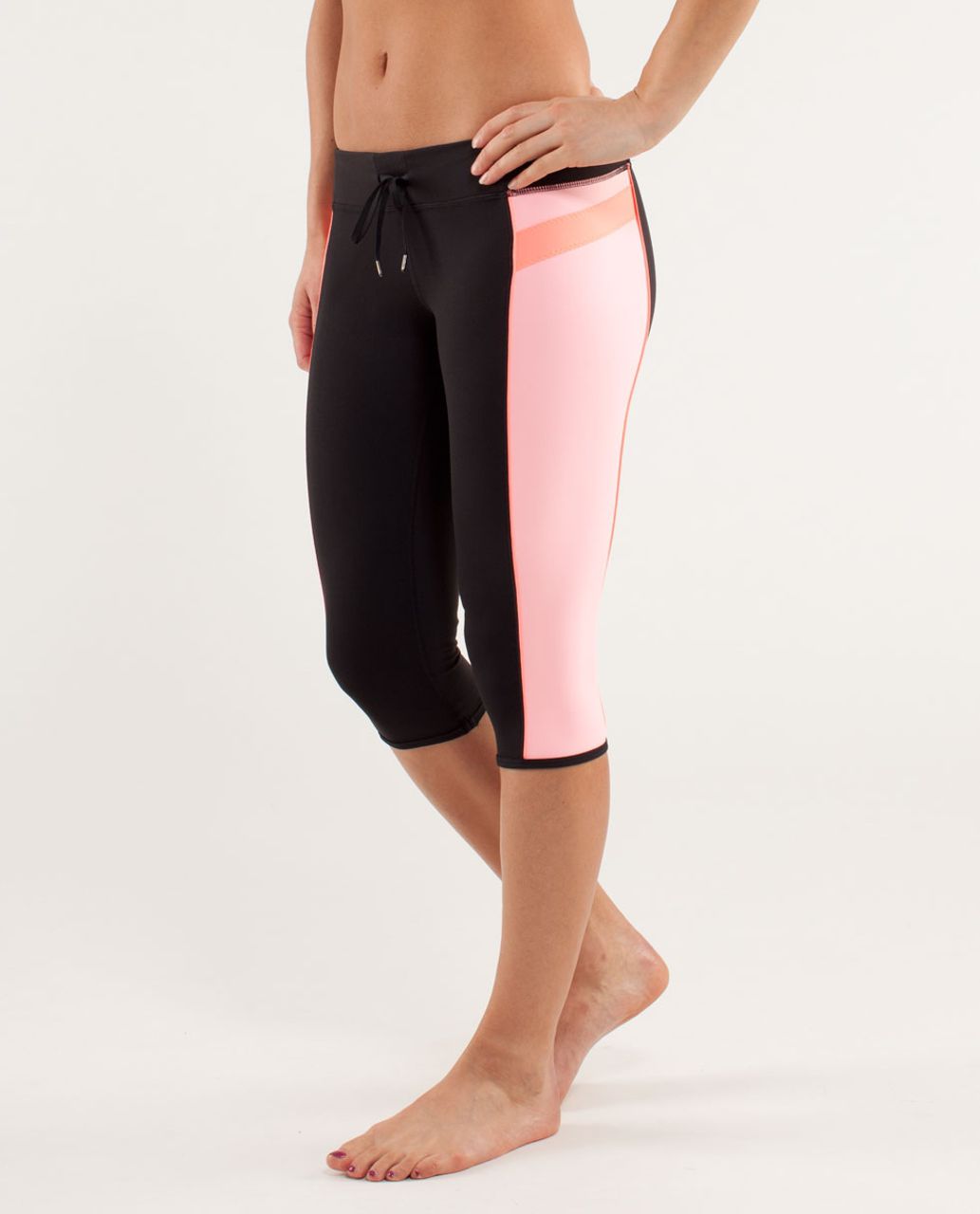 Lululemon Heat It Up Crop - Black / Bleached Coral / Pop Orange