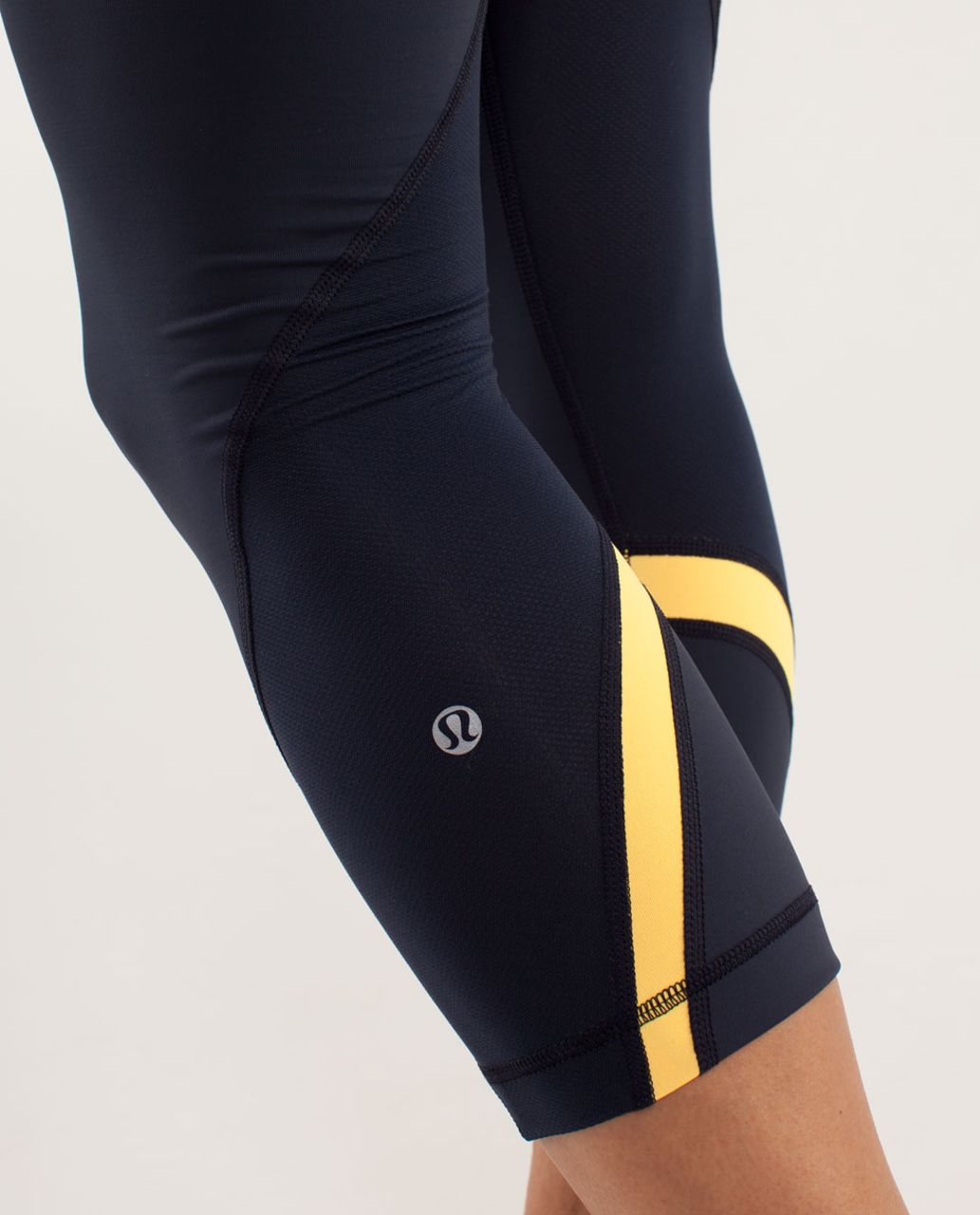 Lululemon Run:  Inspire Crop II - Inkwell / Mellow Lemon / Burning Yellow