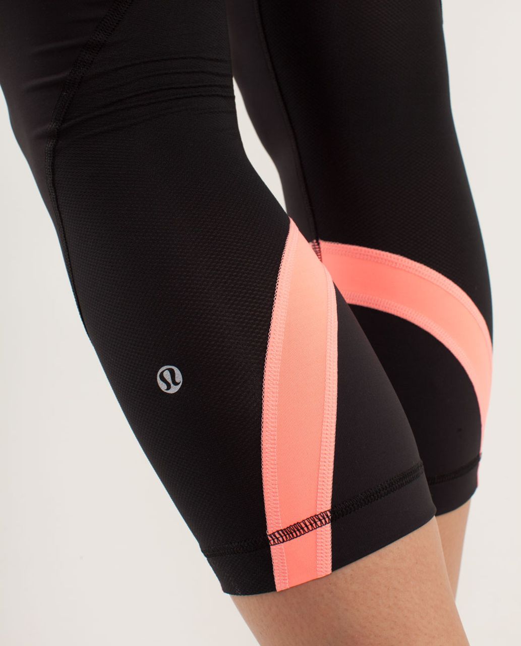 Lululemon Run:  Inspire Crop II - Black / Pop Orange