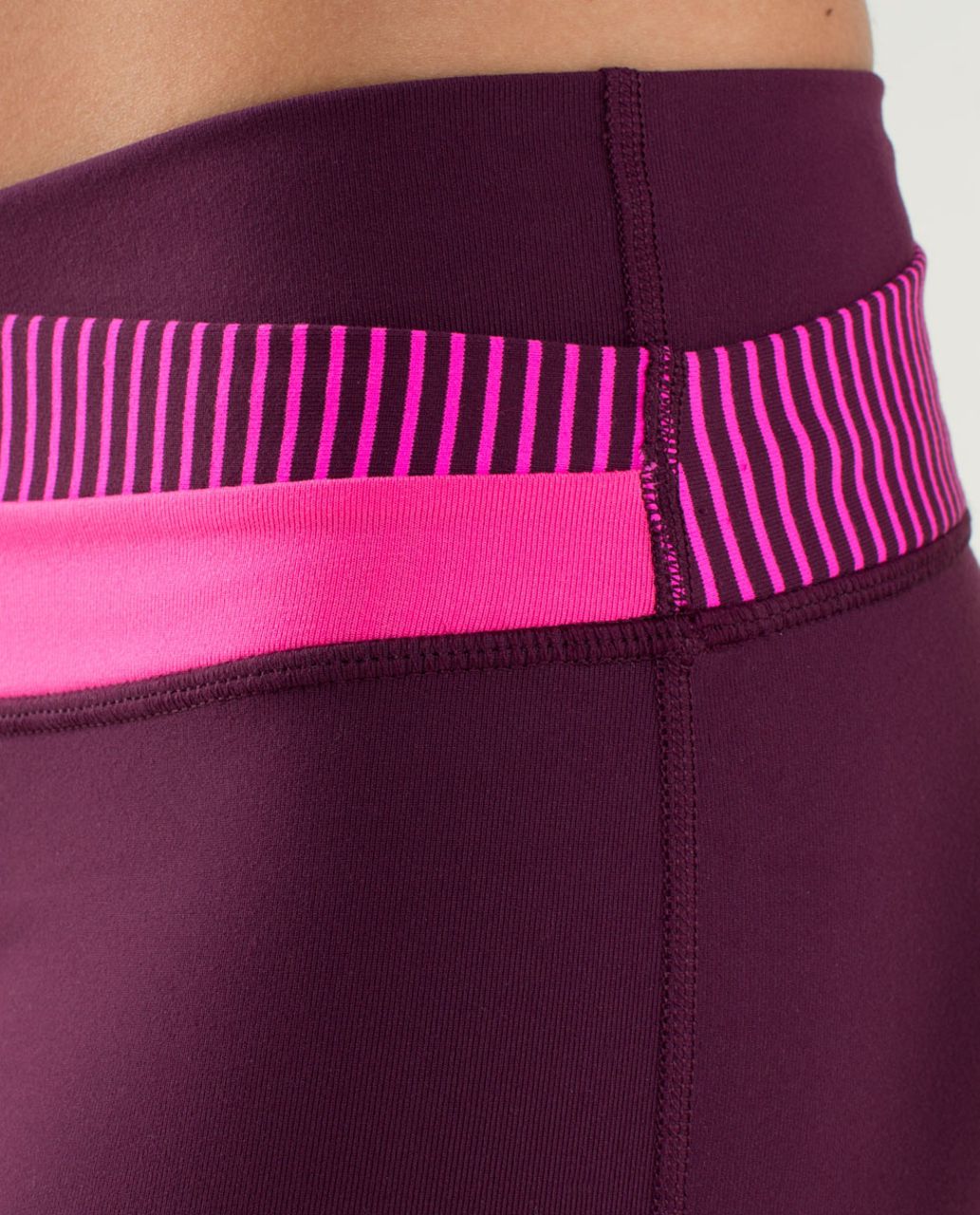 Lululemon Astro Black Pants w layered pink/purple Waist Band