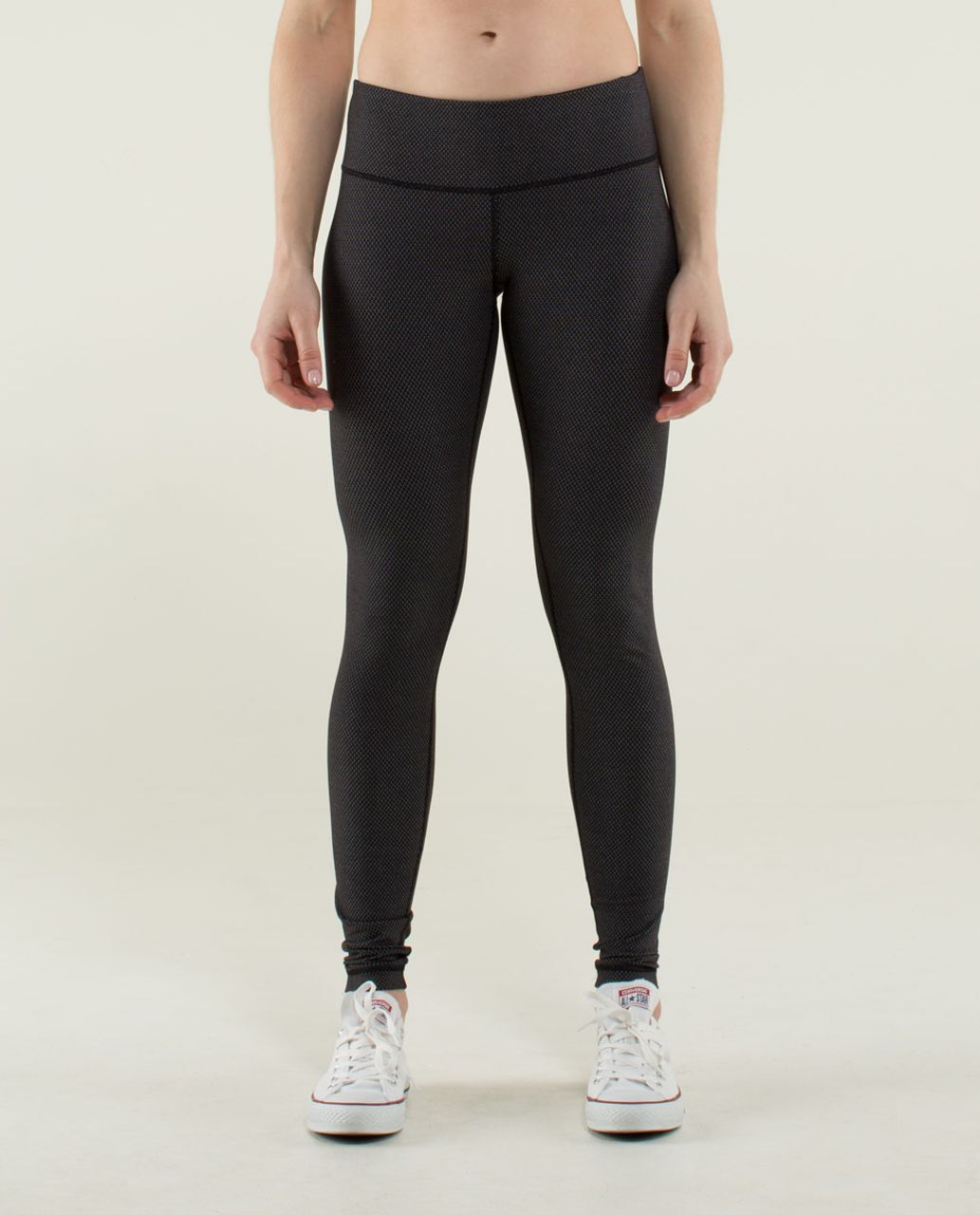 black lululemon leggings with white dots