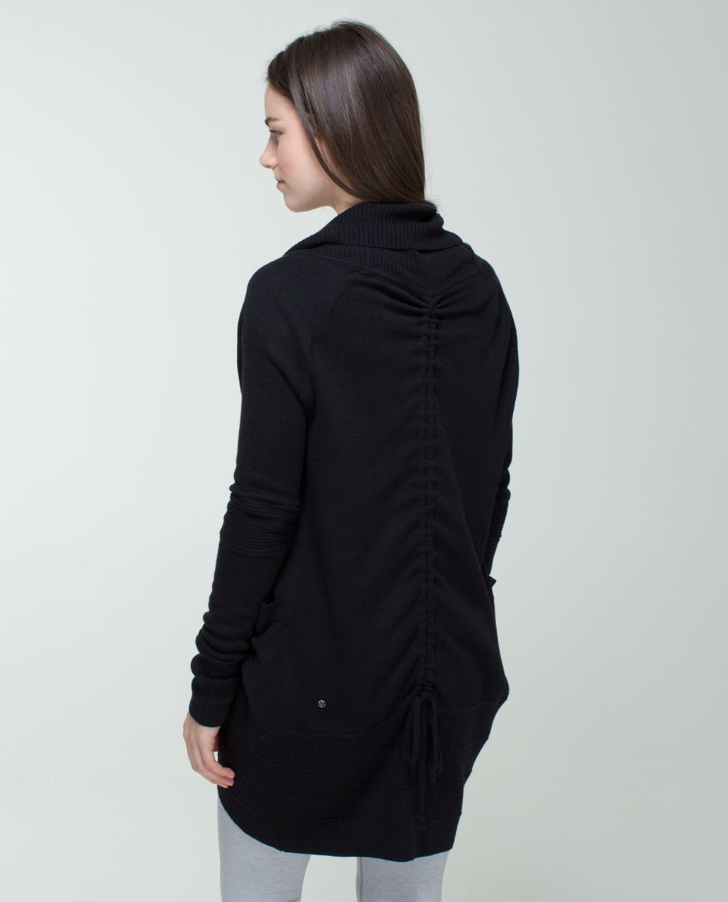 Transformational Sweater from Lululemon. I own this. It's reversible and  has a cinch to change length. Lik…