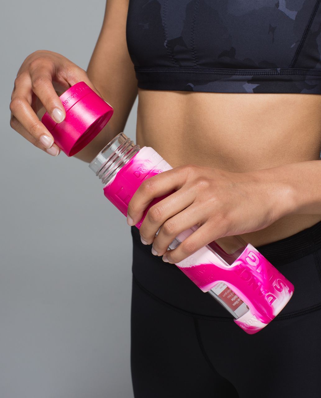 https://storage.googleapis.com/lulu-fanatics/product/21693/1280/lululemon-pure-focus-glass-water-bottle-jewelled-magenta-blush-quartz-jewelled-magenta-19001-133646.jpg