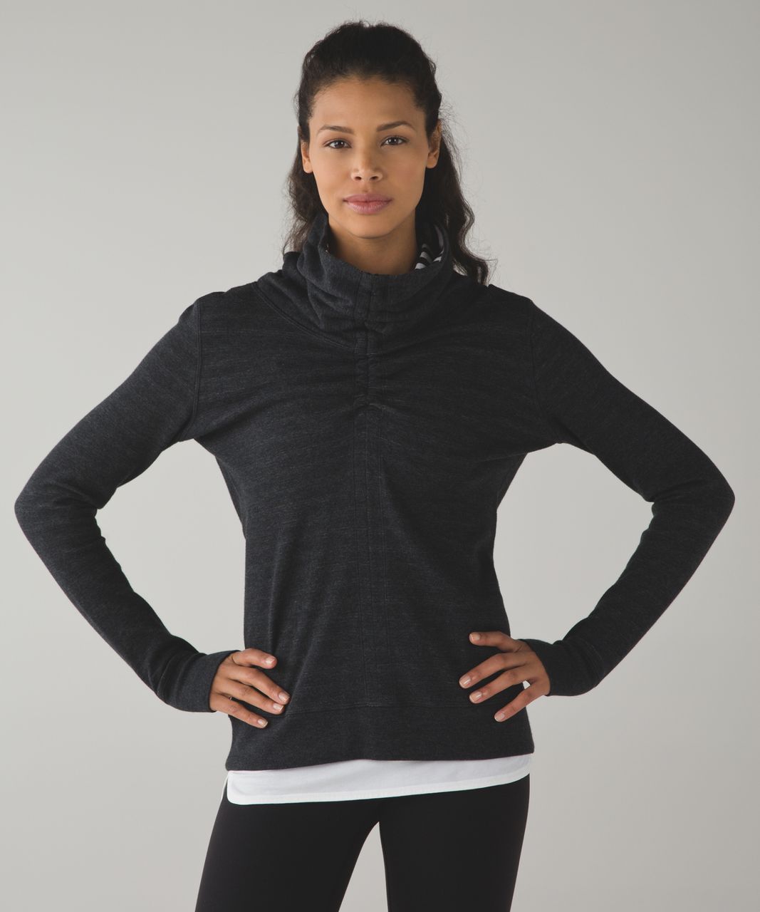 Transformational Sweater from Lululemon. I own this. It's reversible and  has a cinch to change length. Lik…