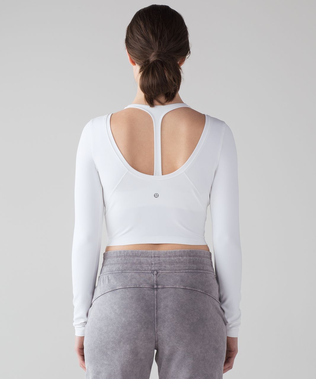 https://storage.googleapis.com/lulu-fanatics/product/25719/1280/lululemon-arise-cropped-long-sleeve-white-0002-157890.jpg