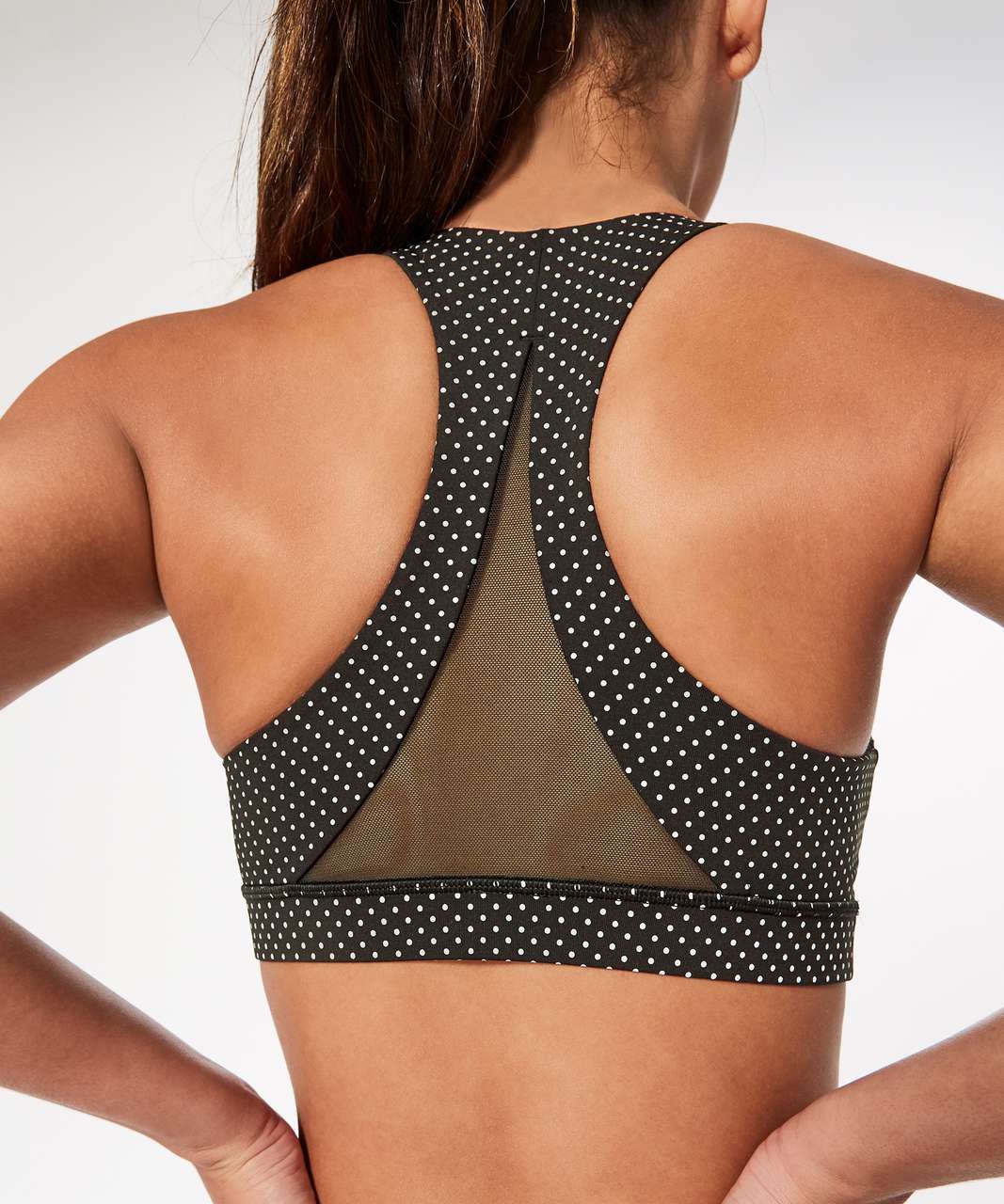 https://storage.googleapis.com/lulu-fanatics/product/28060/1280/lululemon-invigorate-bra-shine-bright-reflective-polka-dot-silver-black-029757-171903.jpg