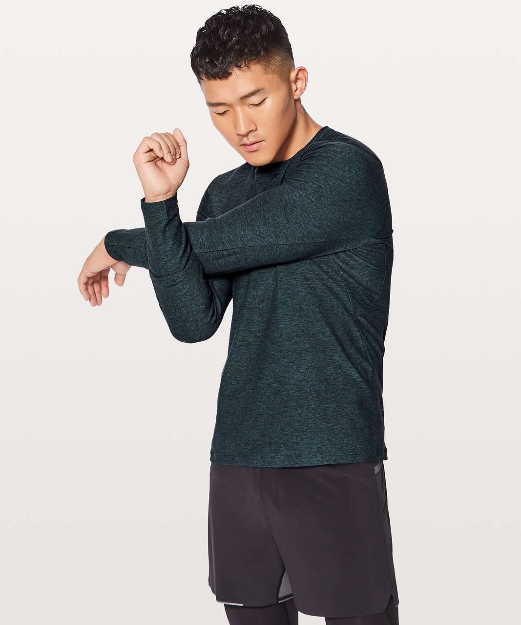 Lululemon Surge Warm Long Sleeve - Heathered Nocturnal Teal / Black